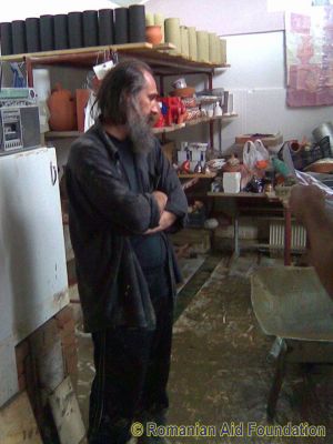 Aftermath of the Flood
Petrica Maxim in his devastated workshop.
Keywords: Flood2010