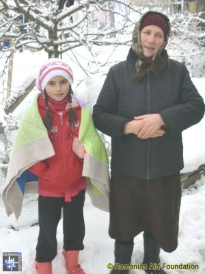 Cosmina and Olga
Cosmina with hand-knitted blanket 
Keywords: Feb13;Fam-Tataraseni;Knits