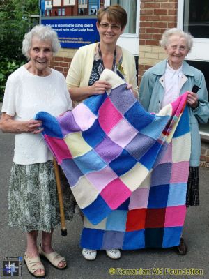 Knitted Blankets from Redhill
Knitted blankets prepared by residents of a sheltered housing scheme in Redhill.
Keywords: Jul13;packing;knits