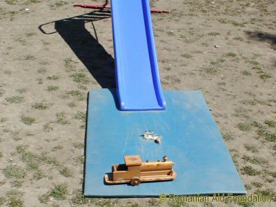 The Playground
Not much of a place to play in, not much of a slide to play on, not much of a toy to play with.
Keywords: Schools;School-Tataraseni