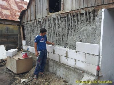 Bechet House
Mugurel reinforcing the rear wall of the Bechet House.
Keywords: Aug12;Fam-Dorohoi;Fam-Dorohoi;Housing;Fam-Dorohoi