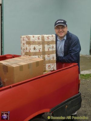 Ovidiu collecting boxes for Eugenie
Eugenie visits elderly people in their homes and in hospital. She to take small gifts such as chocolates and toothpaste, which she received from a sponsor in the UK.
Keywords: May13