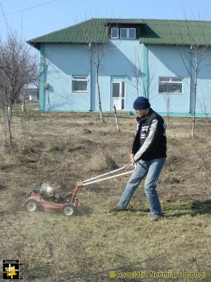 Warehouse Groundsman
Constantin Punga prepares the warehouse grounds.
Keywords: Mar14;AN-Warehouse;Dealu.Mare;Warehouses;