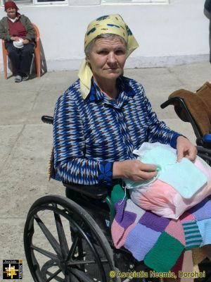 Knitting as Therapy
Residents of Dohoi Old People's Home assemble knitted squares into blankets for their colleagues.
Keywords: May14;Pub1405m;OPH;knits;pub1804a
