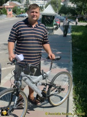 Donated Bicycle
A few months ago Georghe received a bike for his son; now they can ride together.
Keywords: Aug14;Bicycles