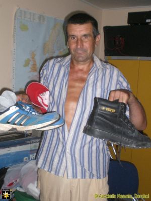 New Boots
A village workman receives some new footwear.
Keywords: Aug16;pub1609s