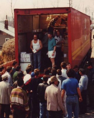 Reception Committee
Most of these villagers had never seen a truck this size and curiosity led them to helping unload items for their local clinic and school.
Keywords: pub1711n